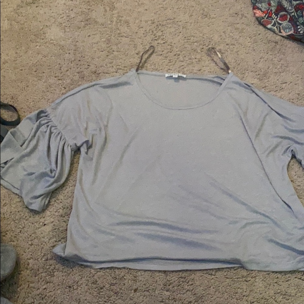 a grey thin long sleeve shirt